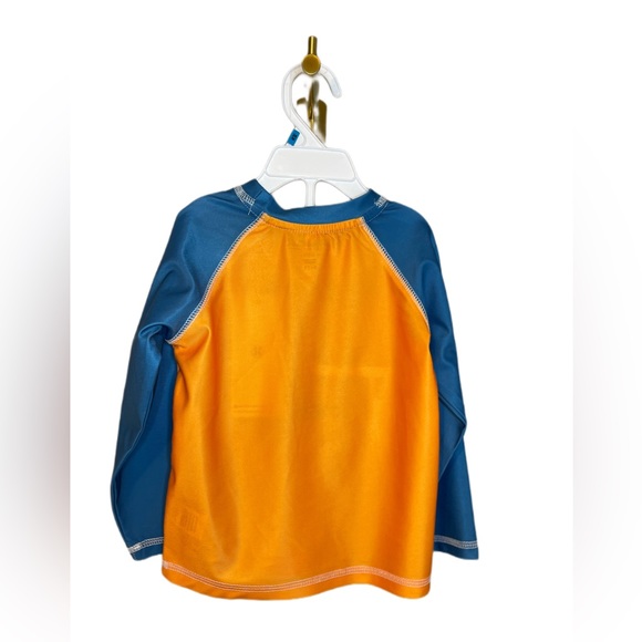 Sovereign Code® Size 24M 2-Piece Sharks Rash Guard and Swim Trunk in Orange - Picture 2 of 3